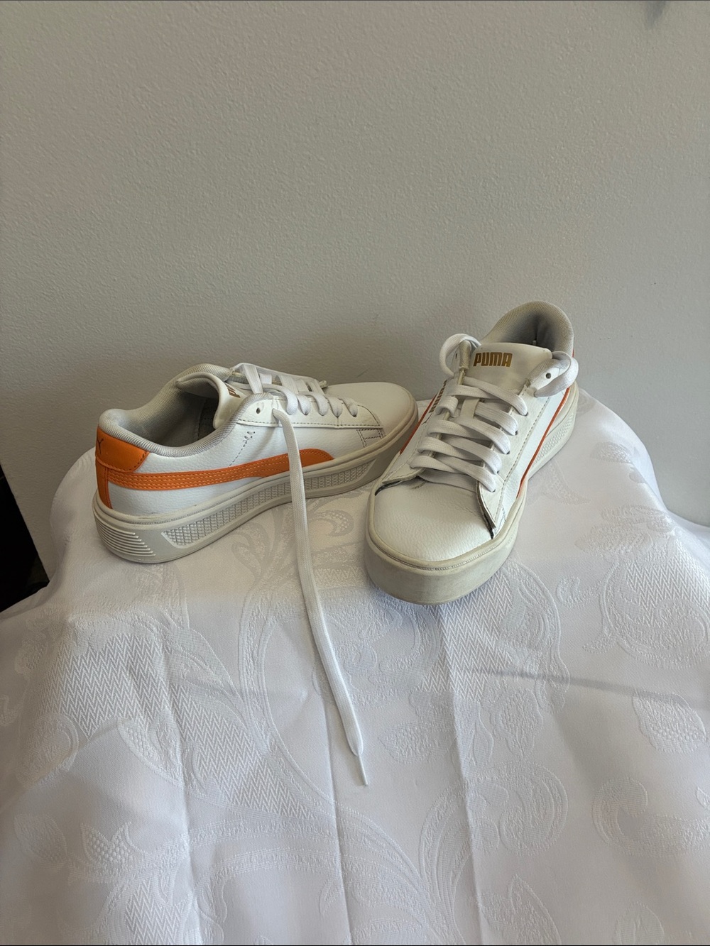 Puma White Sneakers with Orange Accent